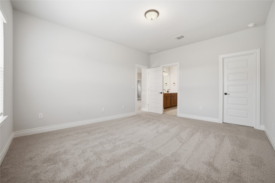 716 Coppell Court Leander, TX 78641 - Photo 20 of 40 a view of an empty room