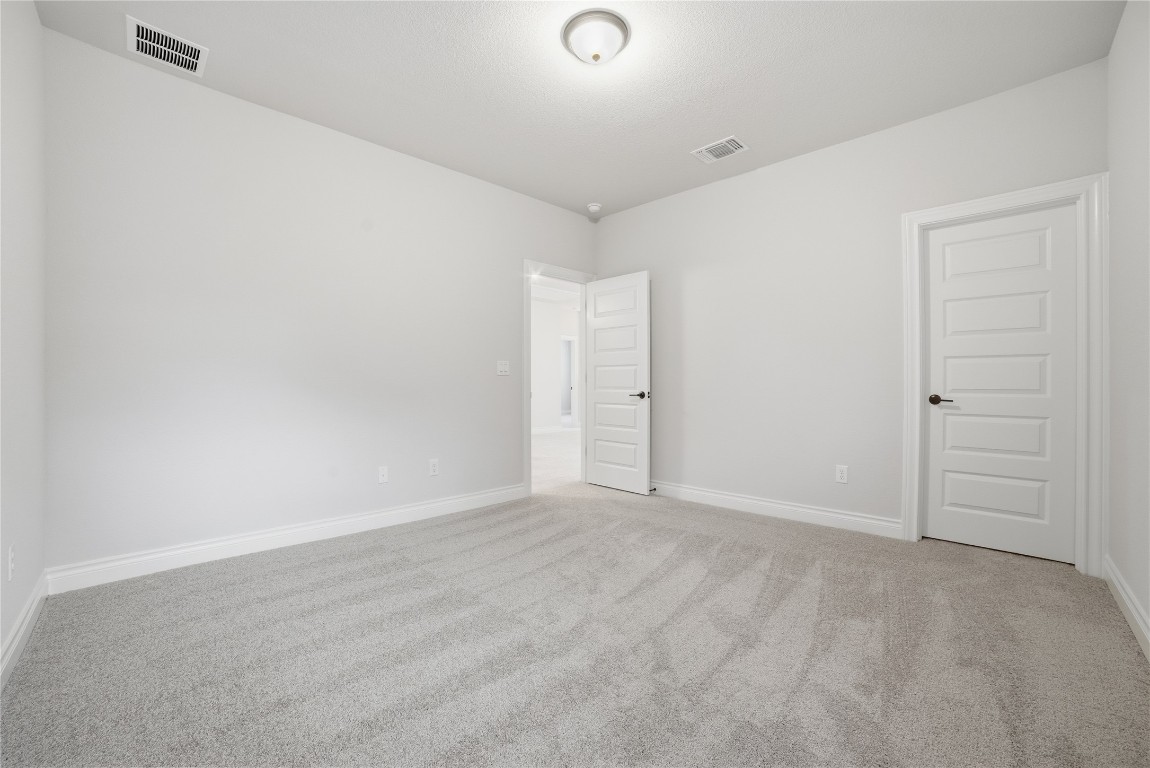 716 Coppell Court Leander, TX 78641 - Photo 24 of 40 a view of an empty room