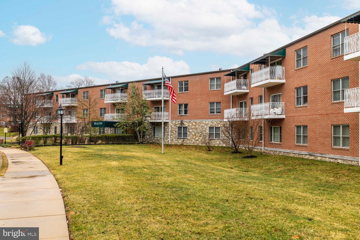 1600 Church Road, Unit D205 Wyncote, PA 19095 - Photo 21 of 21 a view of a swimming pool with an outdoor seating