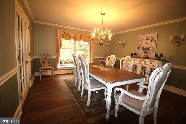 a bathroom with a toilet and a shower curtain