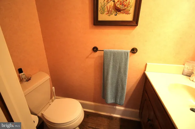 a kitchen with stainless steel appliances a sink and cabinets
