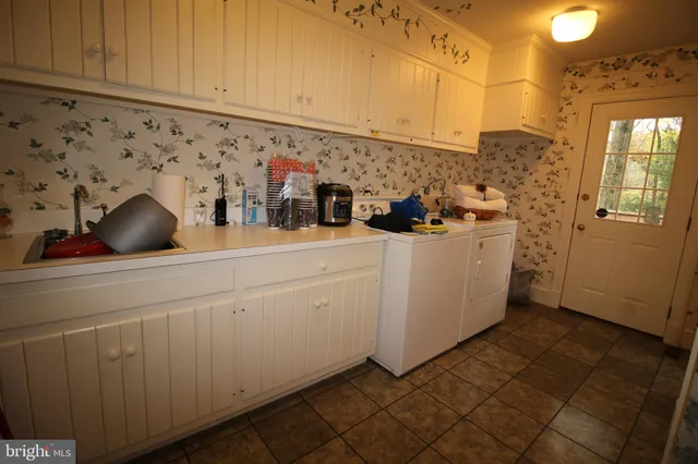 a view of a porch with wooden floor