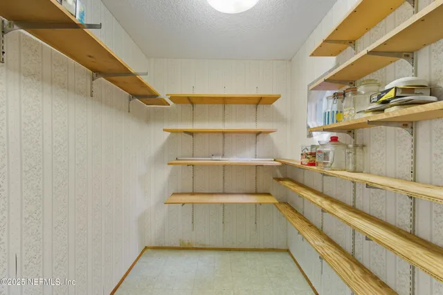 a view of storage and utility room