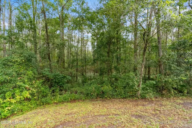 a backyard of a house with seating space