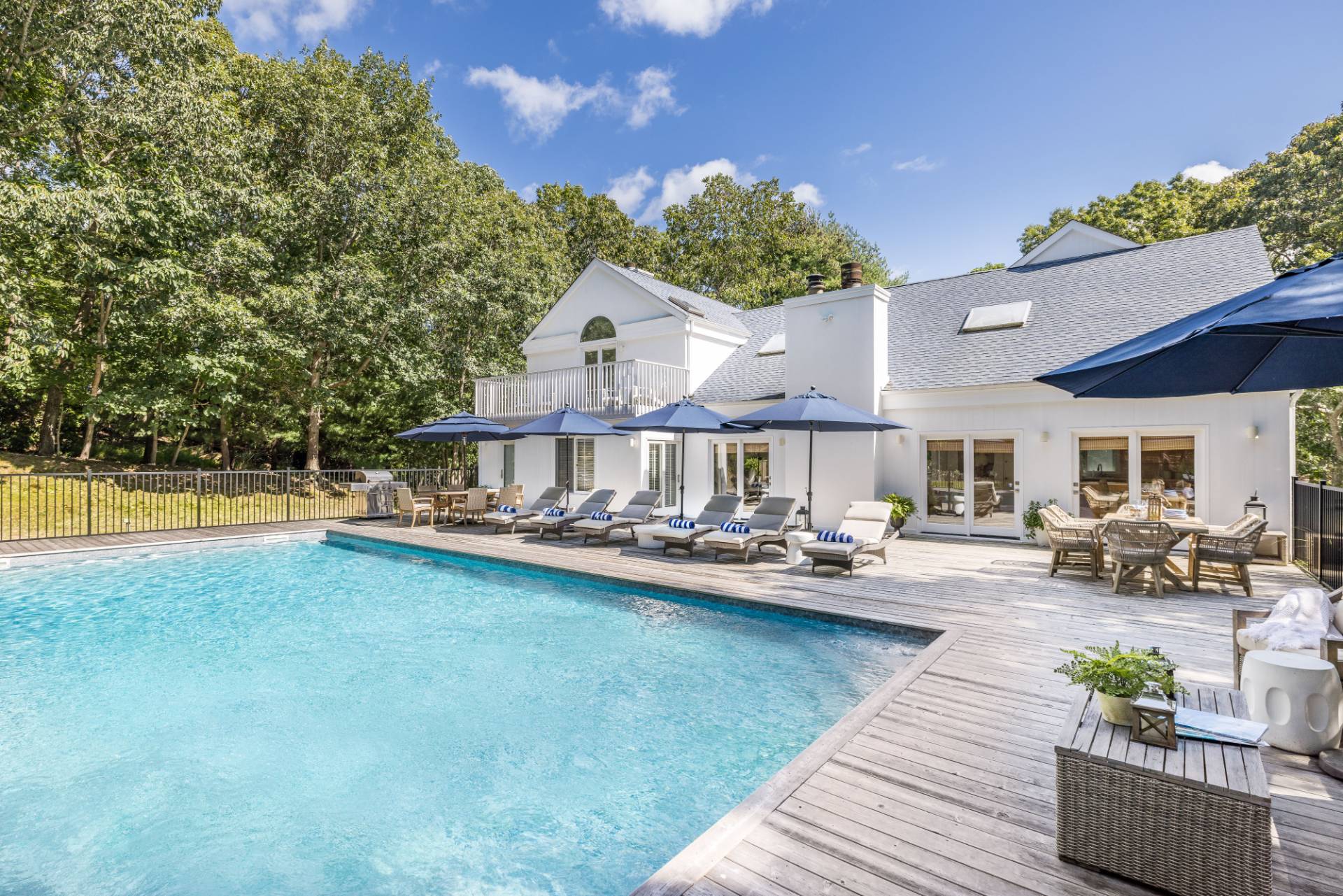5 Wigwam View Lane East Hampton, NY 11937 - Photo 1 of 28 a view of a house with swimming pool and sitting area