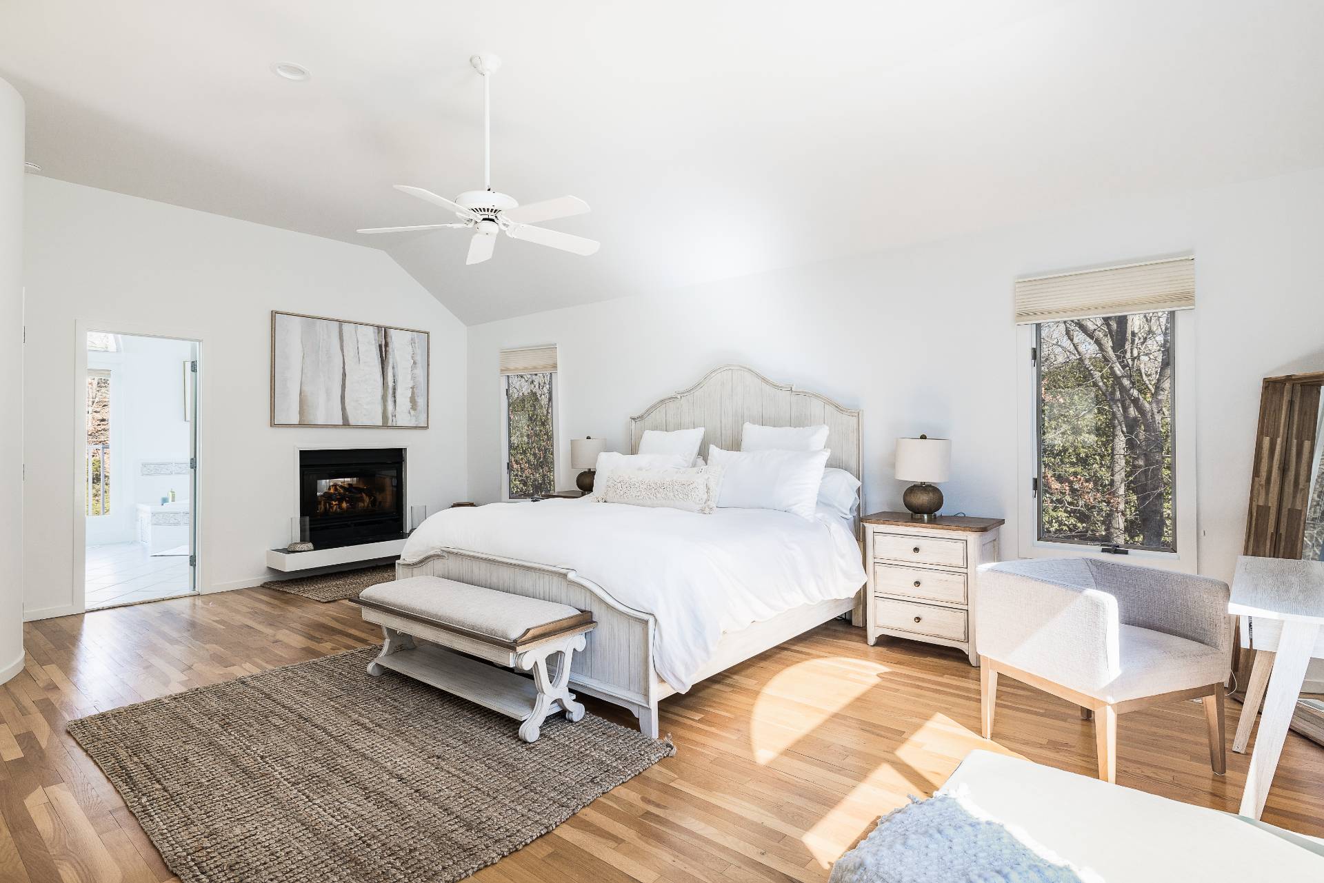 5 Wigwam View Lane East Hampton, NY 11937 - Photo 19 of 28 a bedroom with a bed and a fireplace