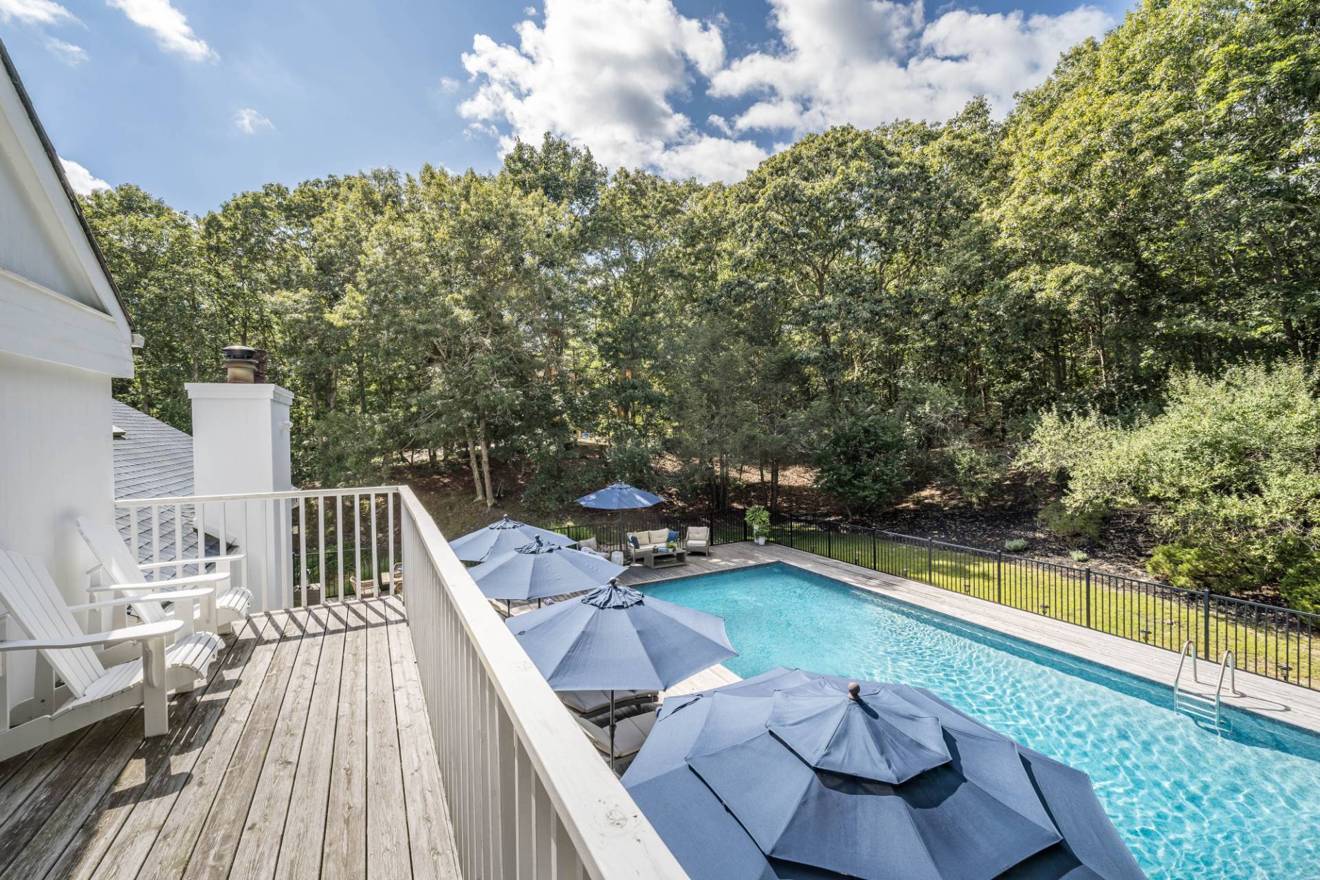 5 Wigwam View Lane East Hampton, NY 11937 - Photo 21 of 28 a view of a balcony with chairs