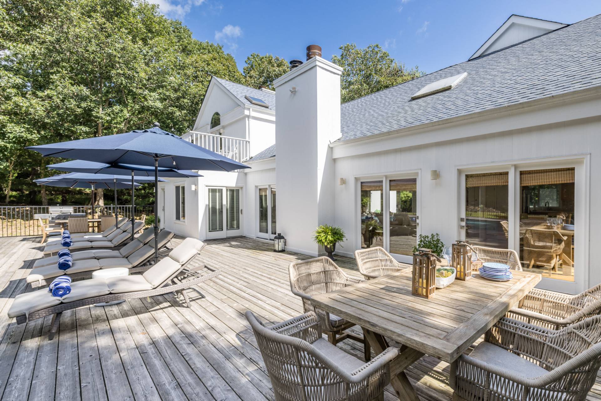 5 Wigwam View Lane East Hampton, NY 11937 - Photo 23 of 28 a view of house with patio outdoor seating and wooden floor