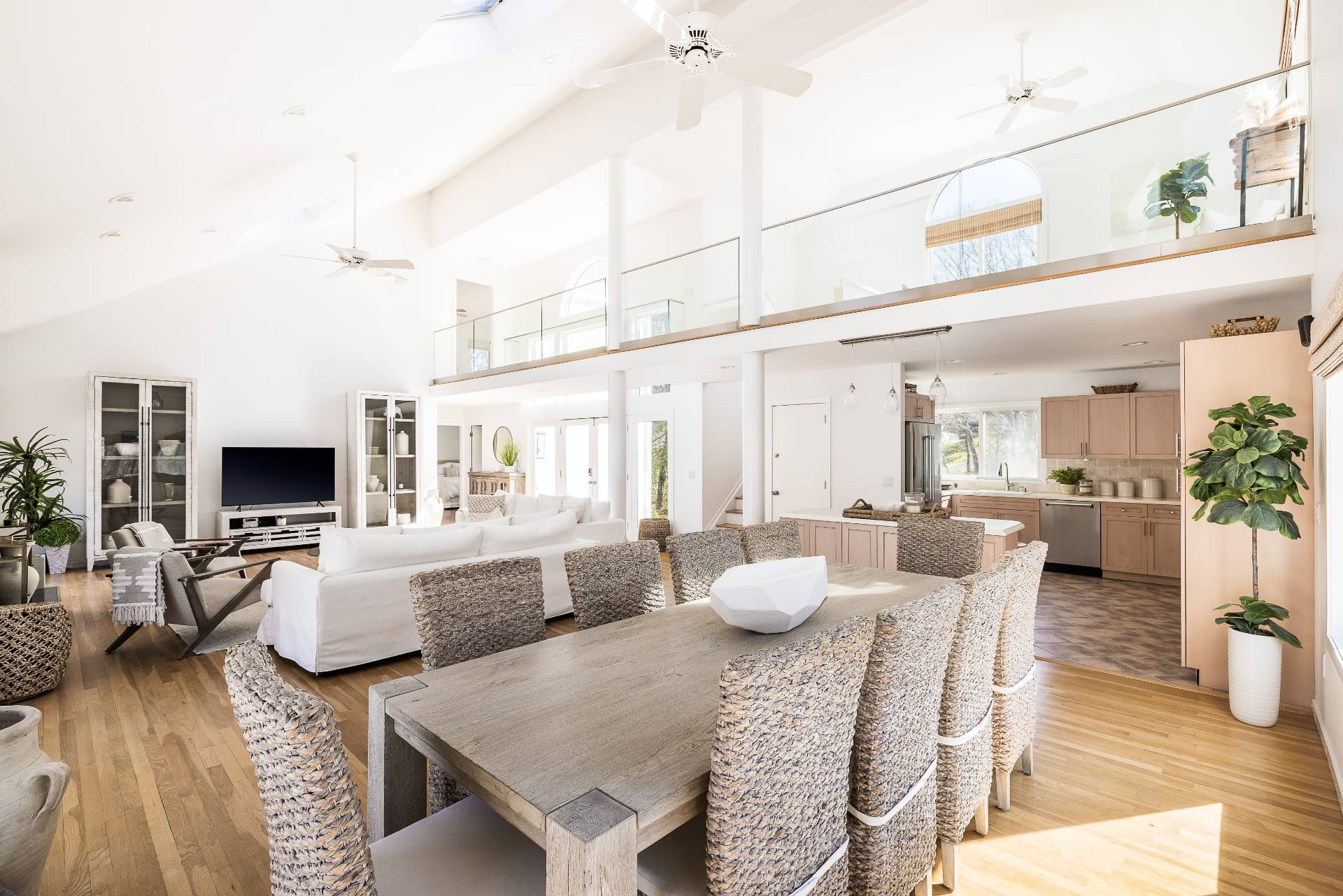 5 Wigwam View Lane East Hampton, NY 11937 - Photo 7 of 28 a large living room with furniture and a flat screen tv