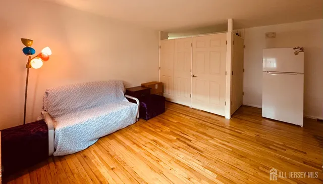 a spacious bedroom with a bed and a table