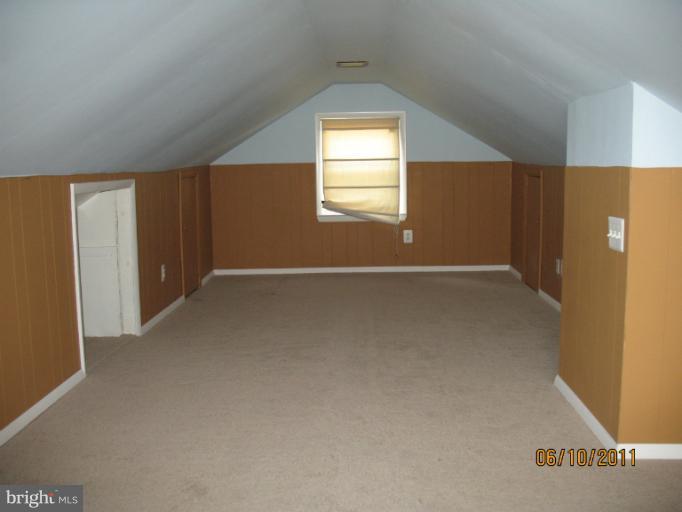 4215 Ivy Glen Road Silver Spring, MD 20906 - Photo 5 of 8 an empty room with windows and closet