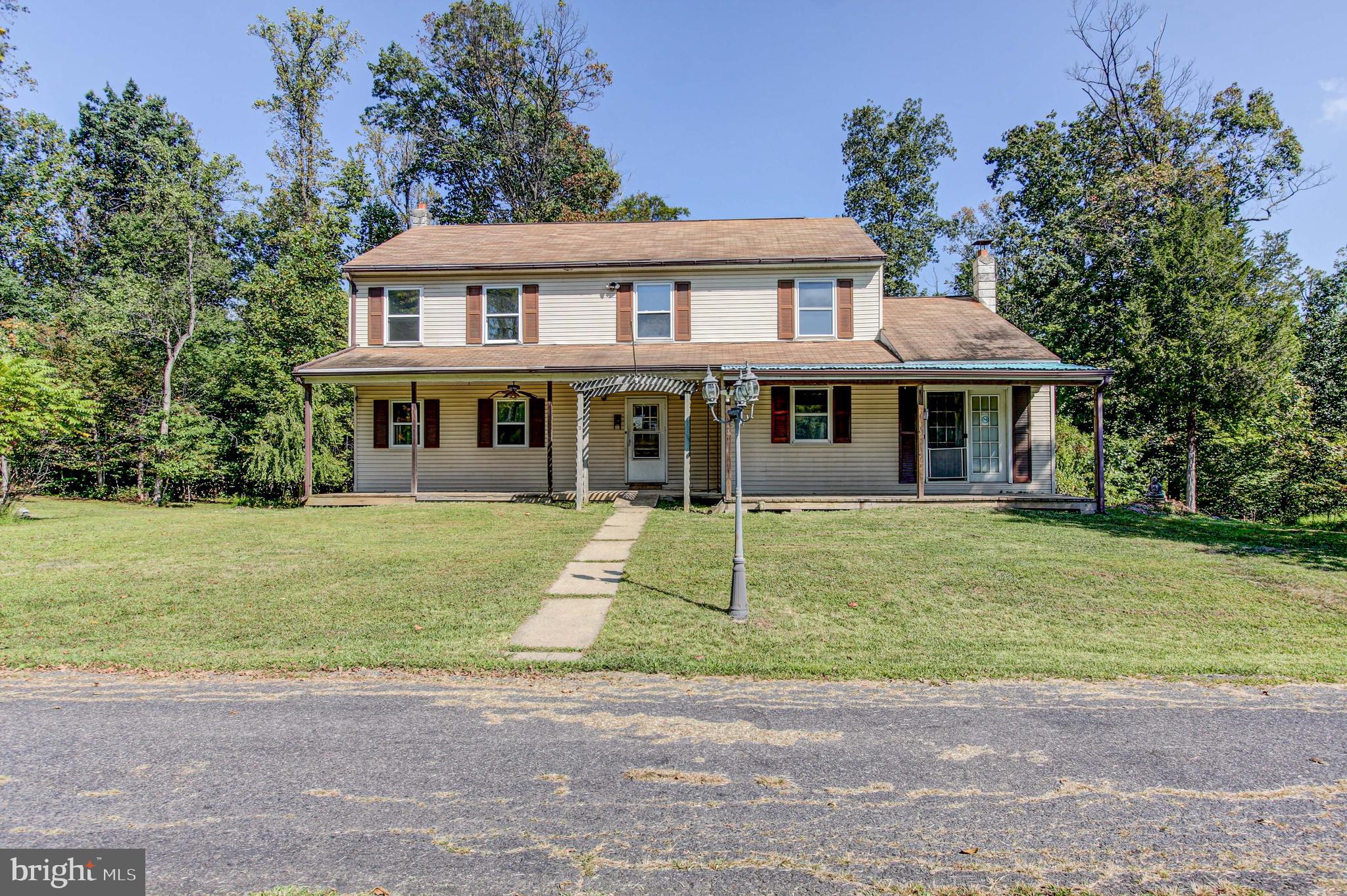 a view of a yard in front of house