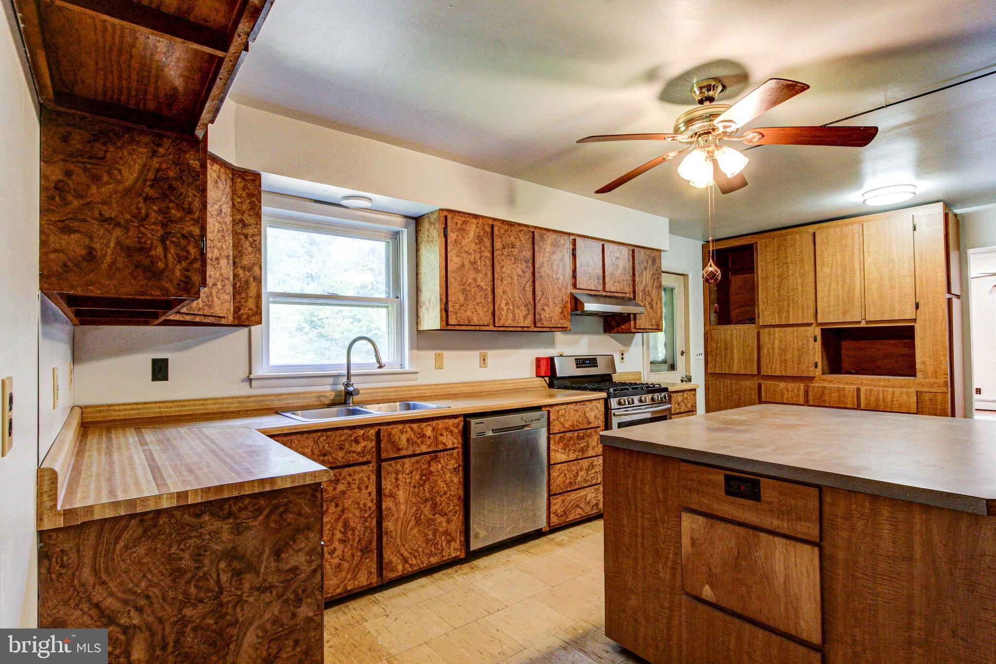 2030 Upper Ridge Road Green Lane, PA 18054 - Photo 11 of 61 a kitchen with a sink a counter space cabinets and appliances