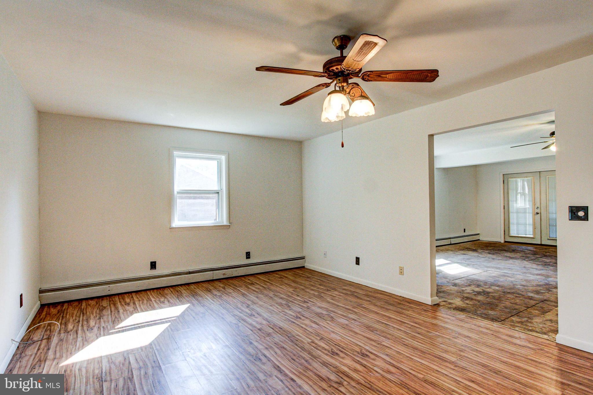 2030 Upper Ridge Road Green Lane, PA 18054 - Photo 18 of 61 wooden floor in an empty room with a window