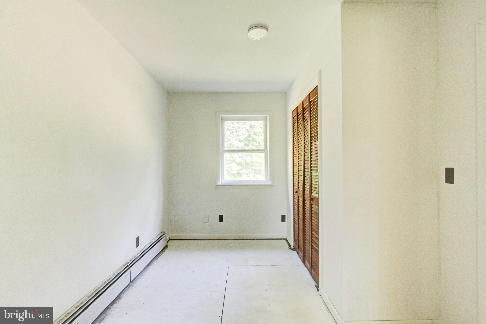 2030 Upper Ridge Road Green Lane, PA 18054 - Photo 24 of 61 a view of an empty room and window