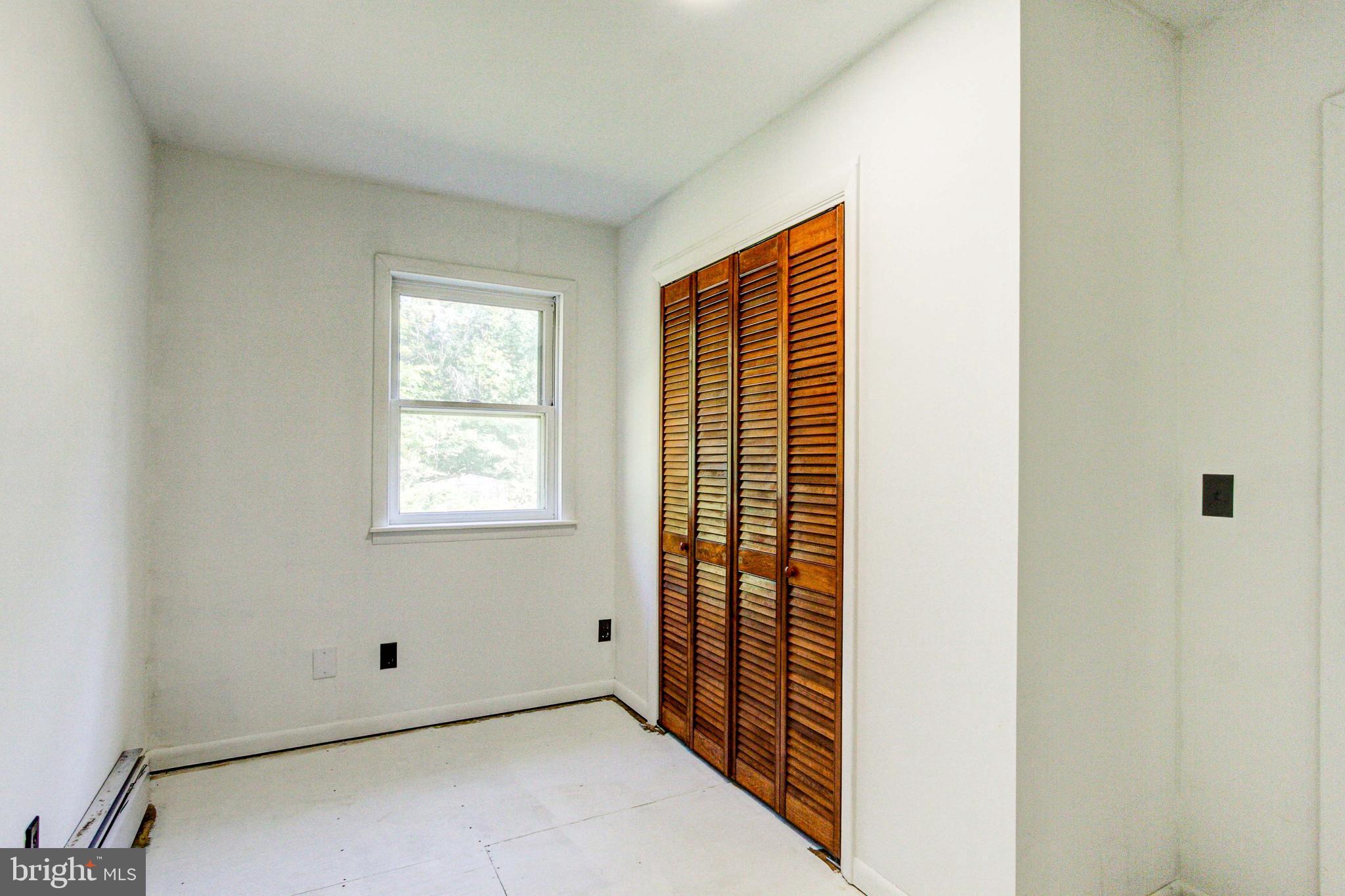 2030 Upper Ridge Road Green Lane, PA 18054 - Photo 26 of 61 a view of an empty room with windows