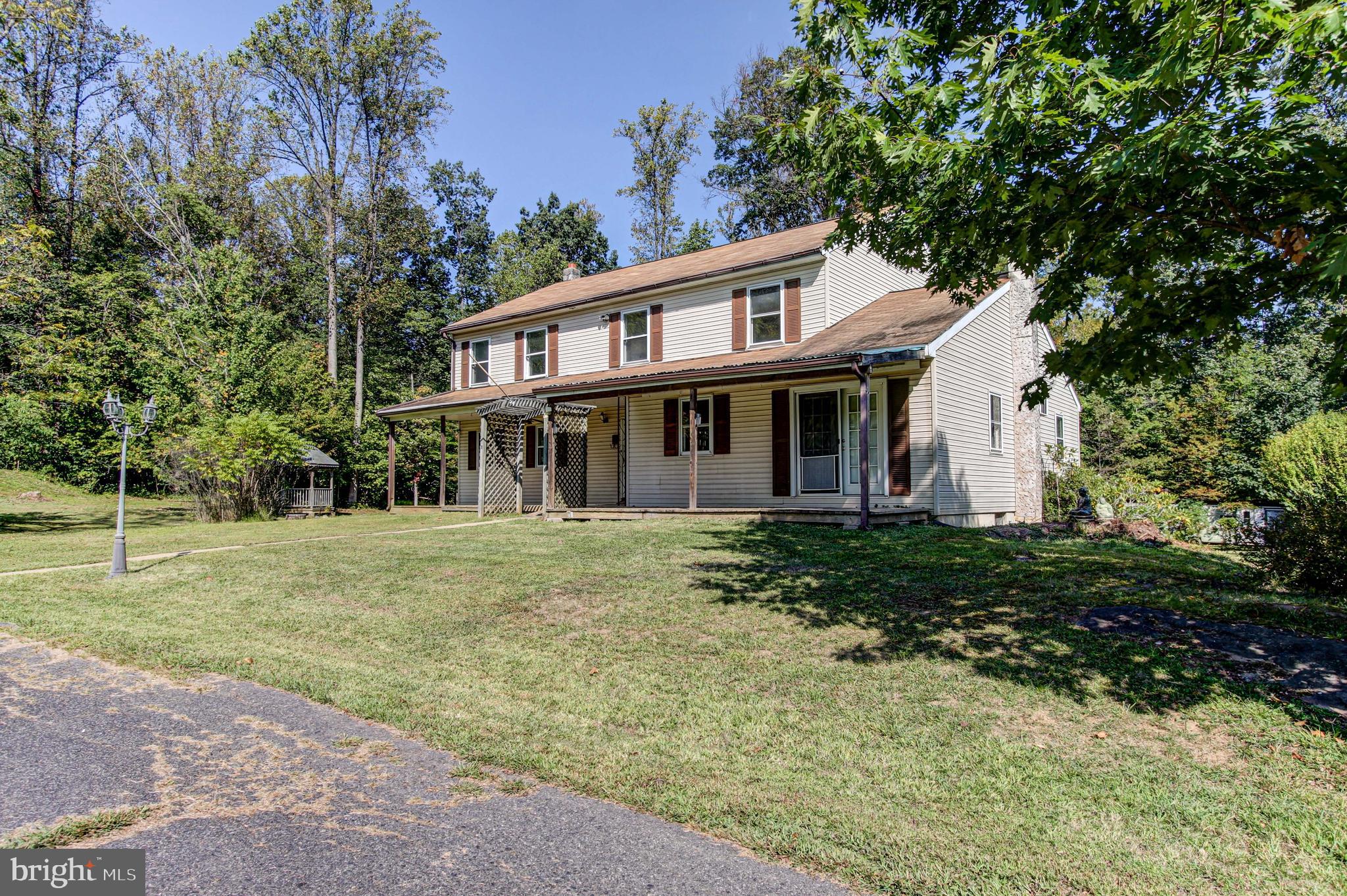 2030 Upper Ridge Road Green Lane, PA 18054 - Photo 3 of 61 a view of a yard in front of house