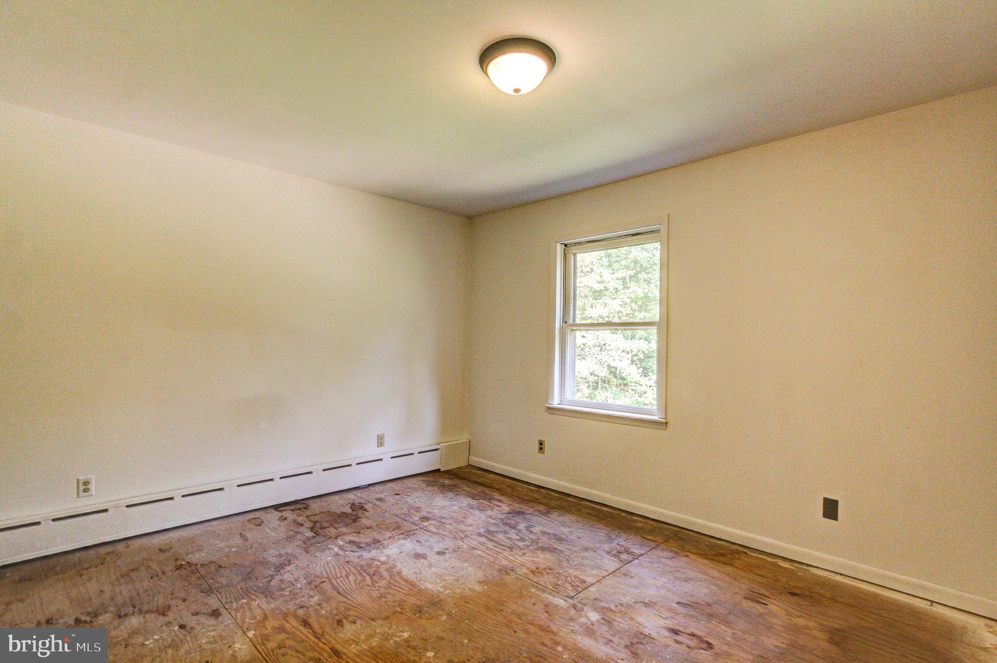 2030 Upper Ridge Road Green Lane, PA 18054 - Photo 33 of 61 an empty room with a window
