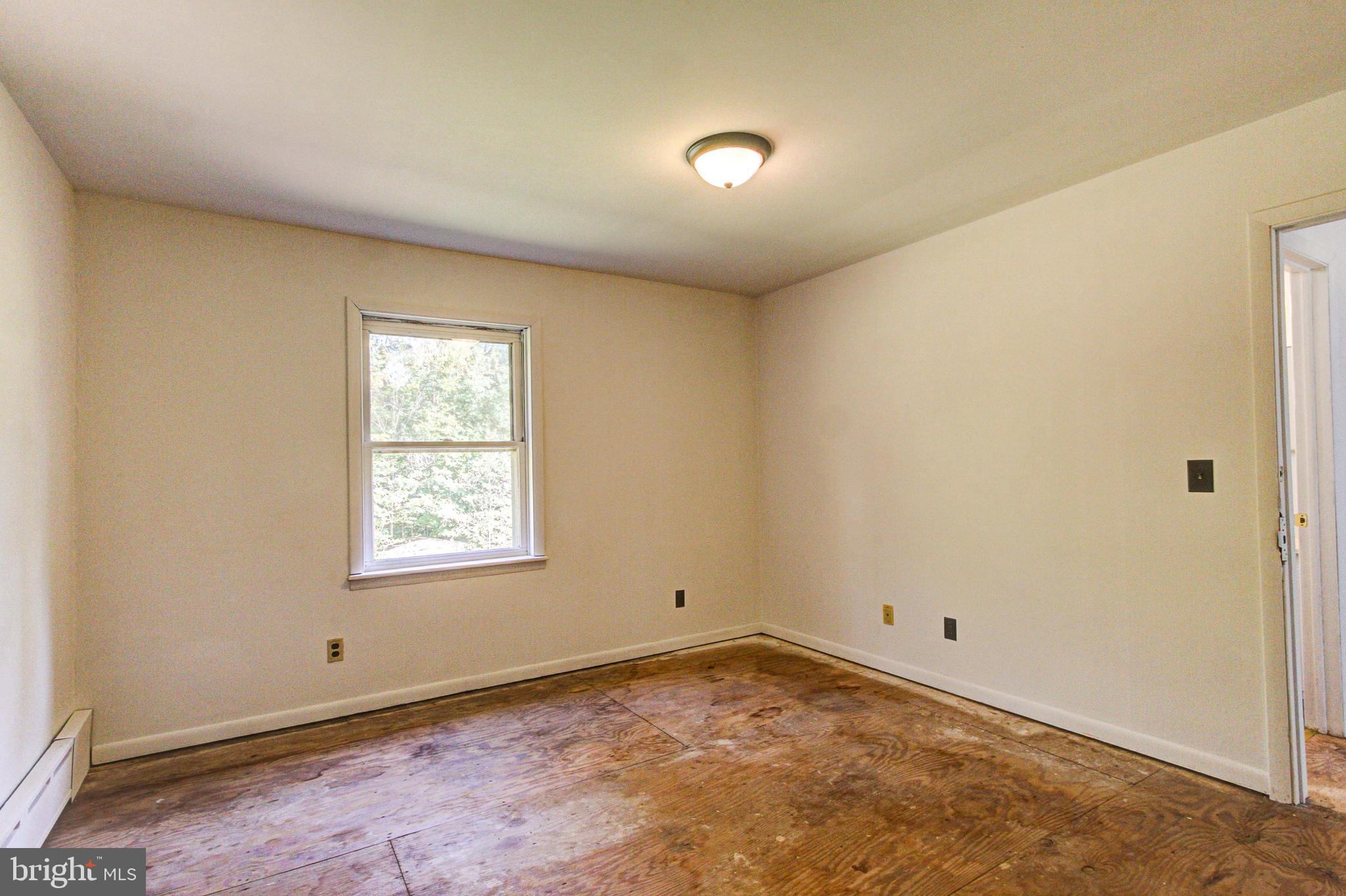 2030 Upper Ridge Road Green Lane, PA 18054 - Photo 34 of 61 an empty room with a window