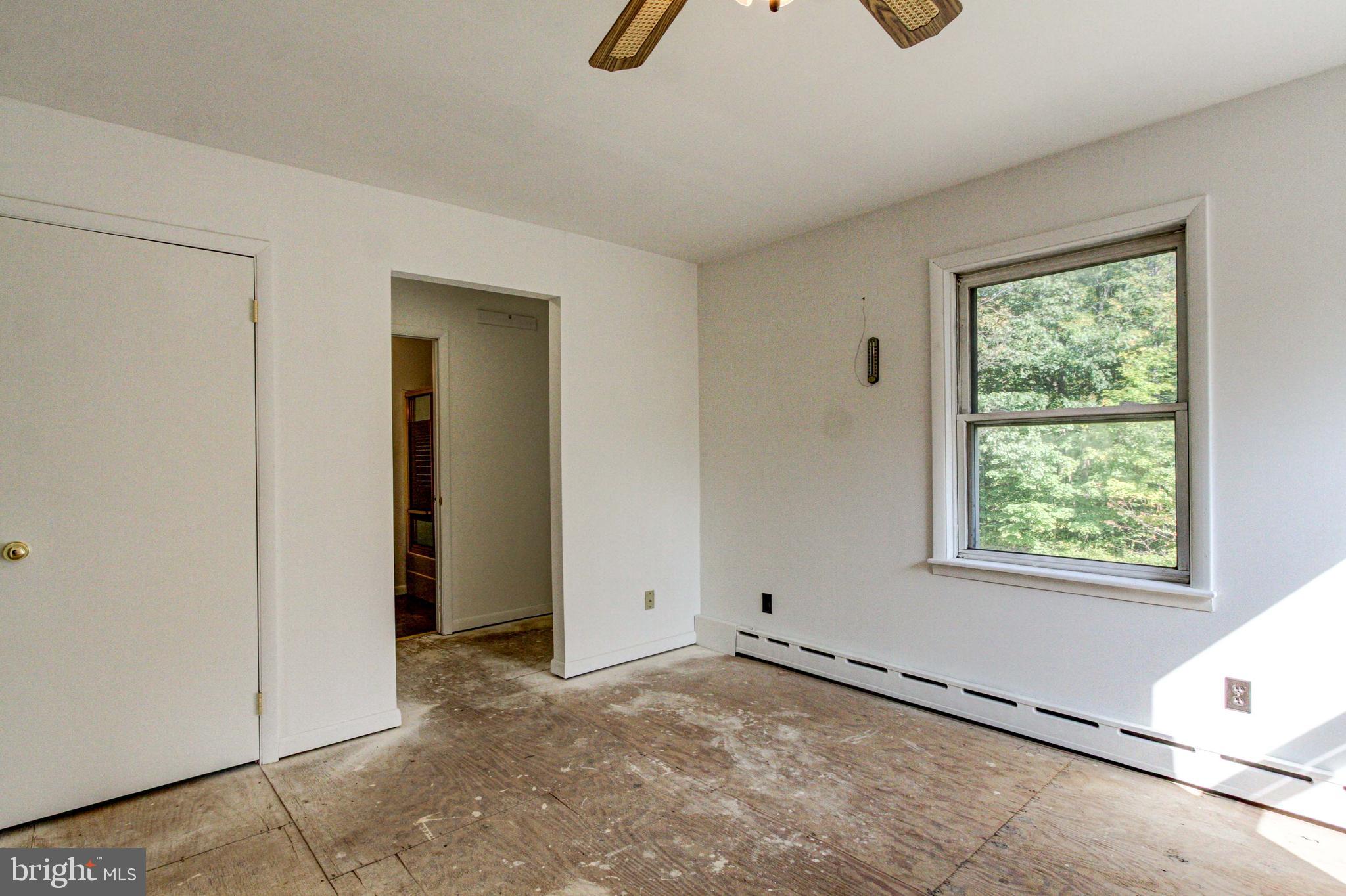 2030 Upper Ridge Road Green Lane, PA 18054 - Photo 37 of 61 an empty room with windows