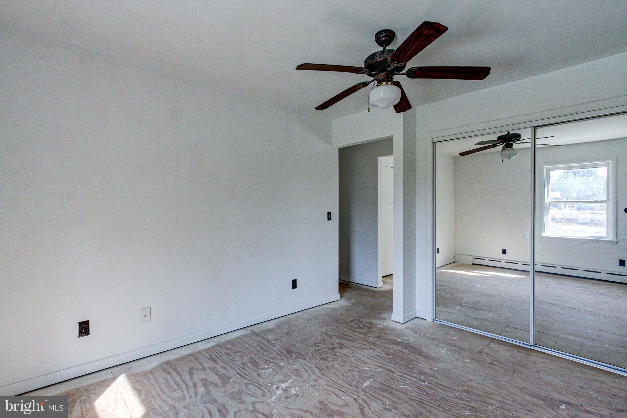 2030 Upper Ridge Road Green Lane, PA 18054 - Photo 39 of 61 a view of empty room with wooden floor