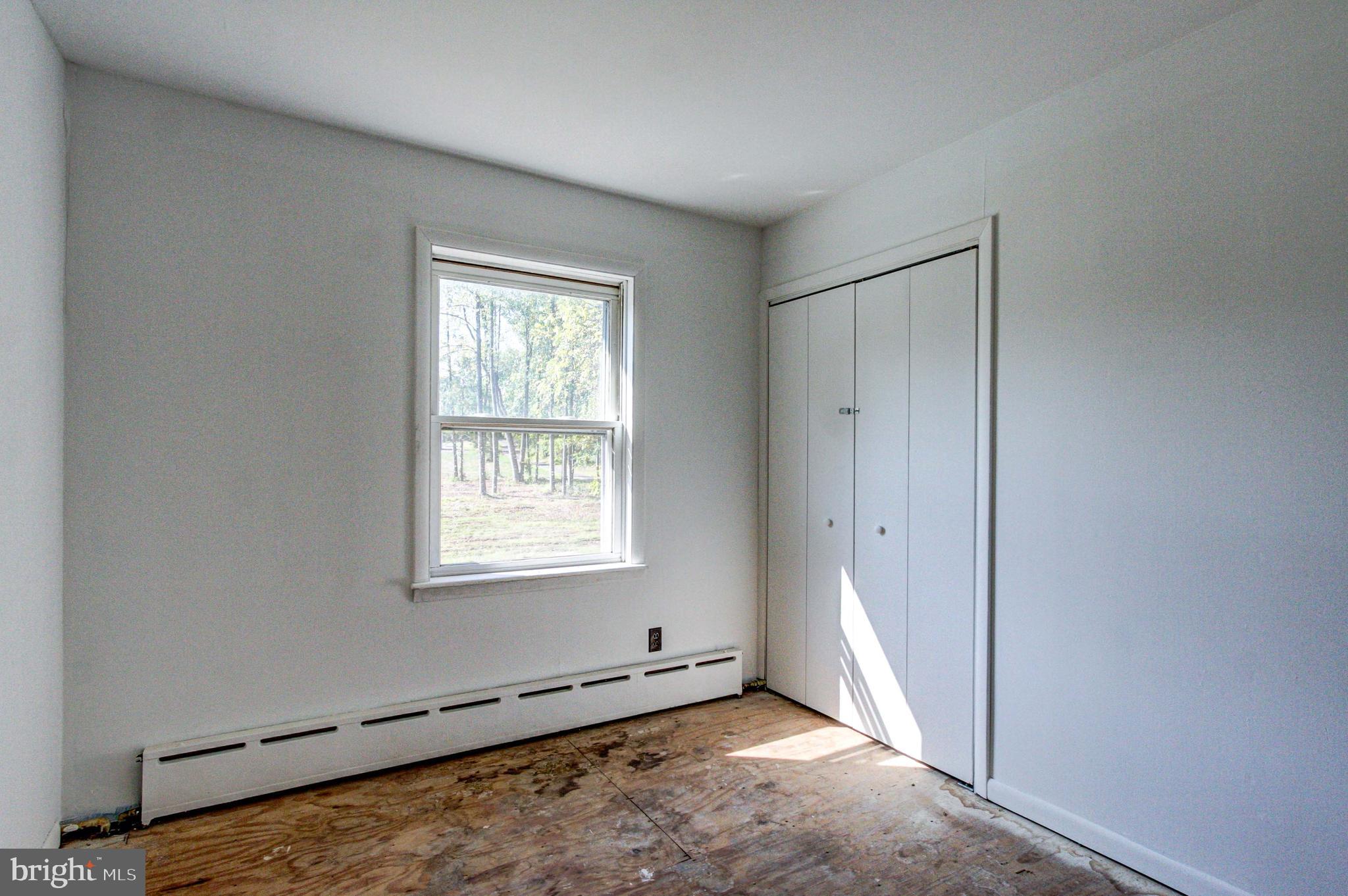 2030 Upper Ridge Road Green Lane, PA 18054 - Photo 42 of 61 a view of an empty room with a window