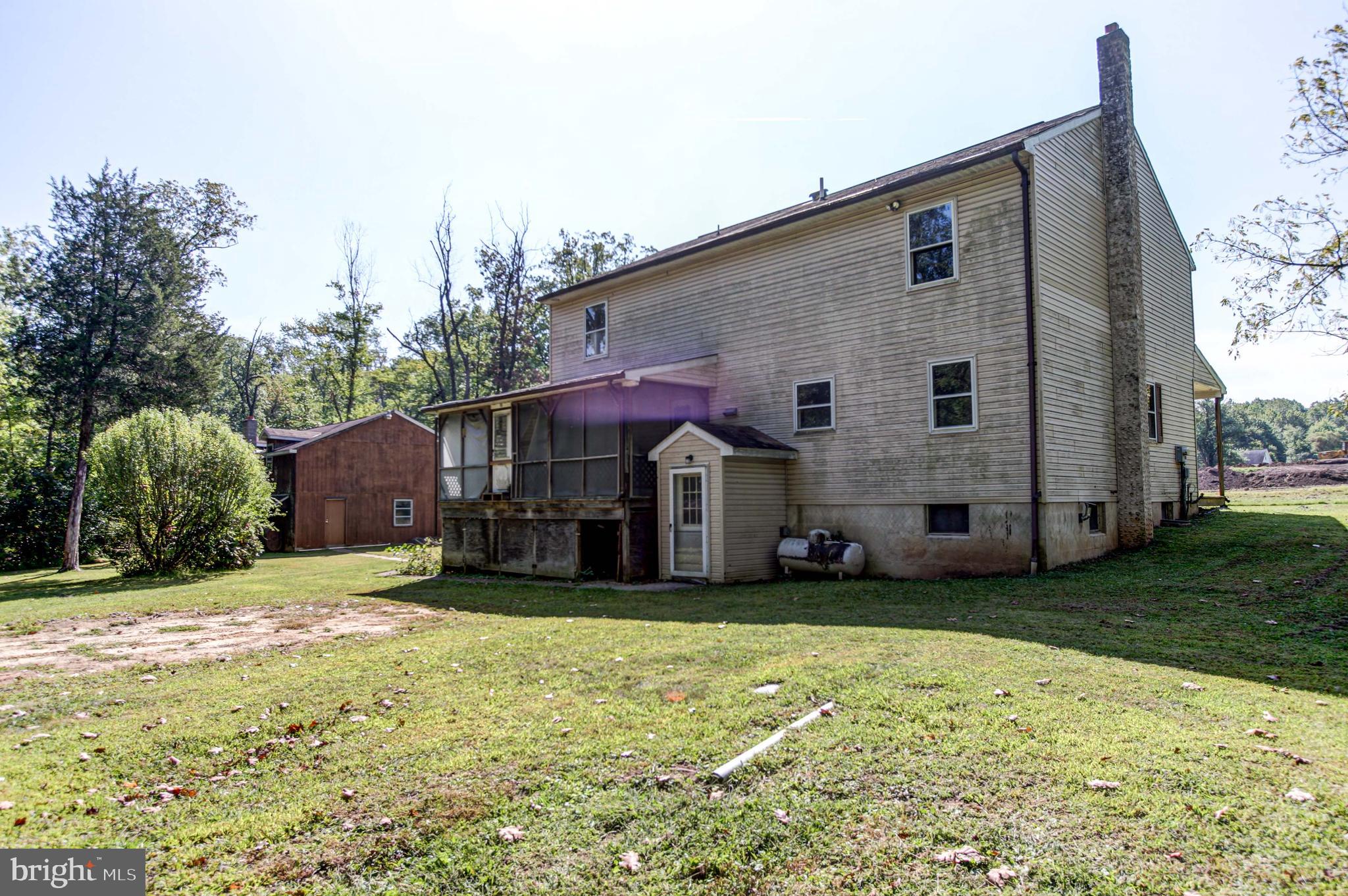 2030 Upper Ridge Road Green Lane, PA 18054 - Photo 45 of 61 a view of a house with a yard
