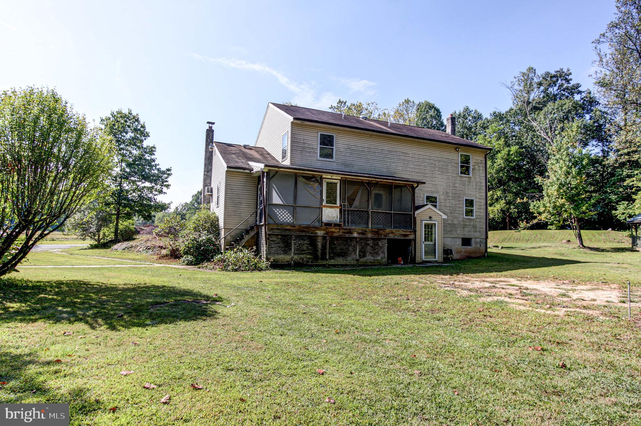 2030 Upper Ridge Road Green Lane, PA 18054 - Photo 47 of 61 a view of a house with a yard and sitting area