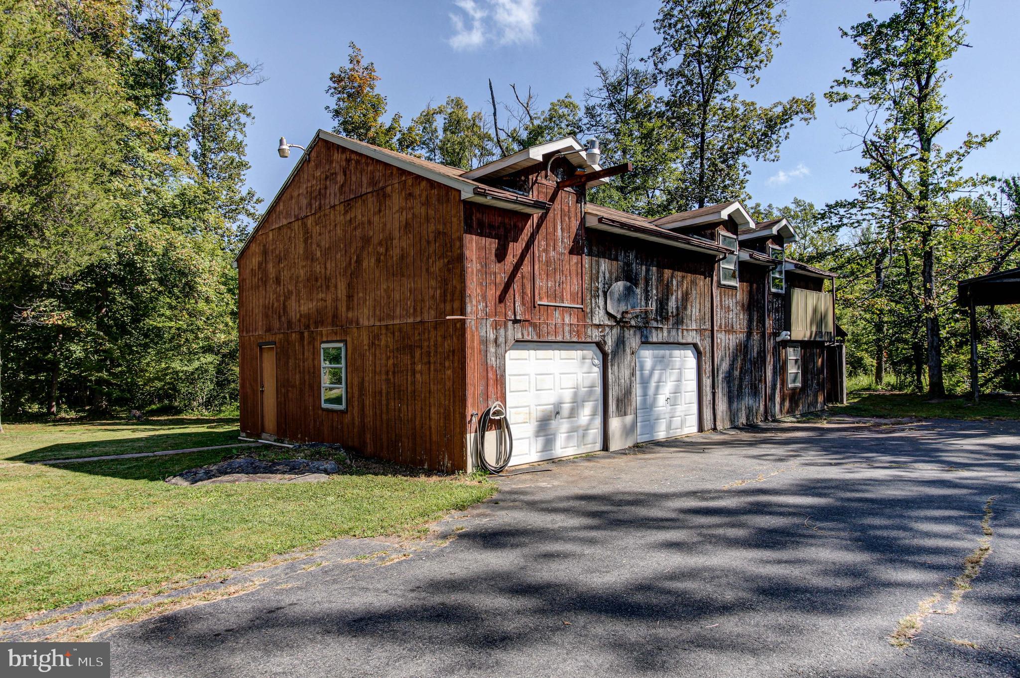 2030 Upper Ridge Road Green Lane, PA 18054 - Photo 48 of 61 a view of a house with a yard