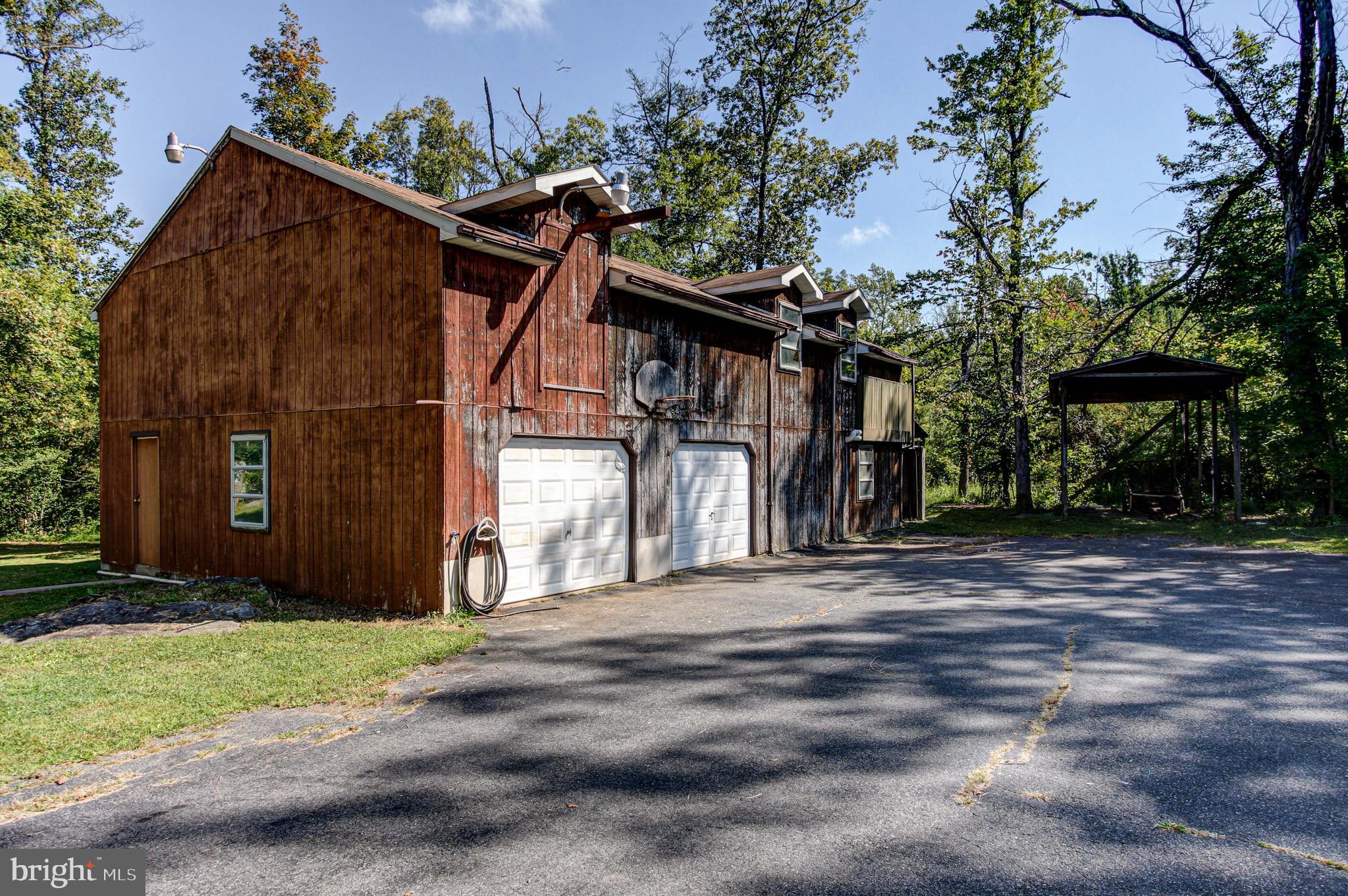 2030 Upper Ridge Road Green Lane, PA 18054 - Photo 49 of 61 a view of a house with a yard