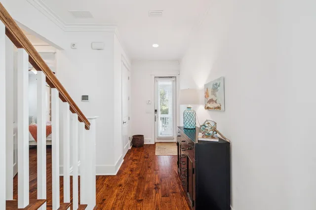 a en suite bathroom with a granite countertop sink and a mirror