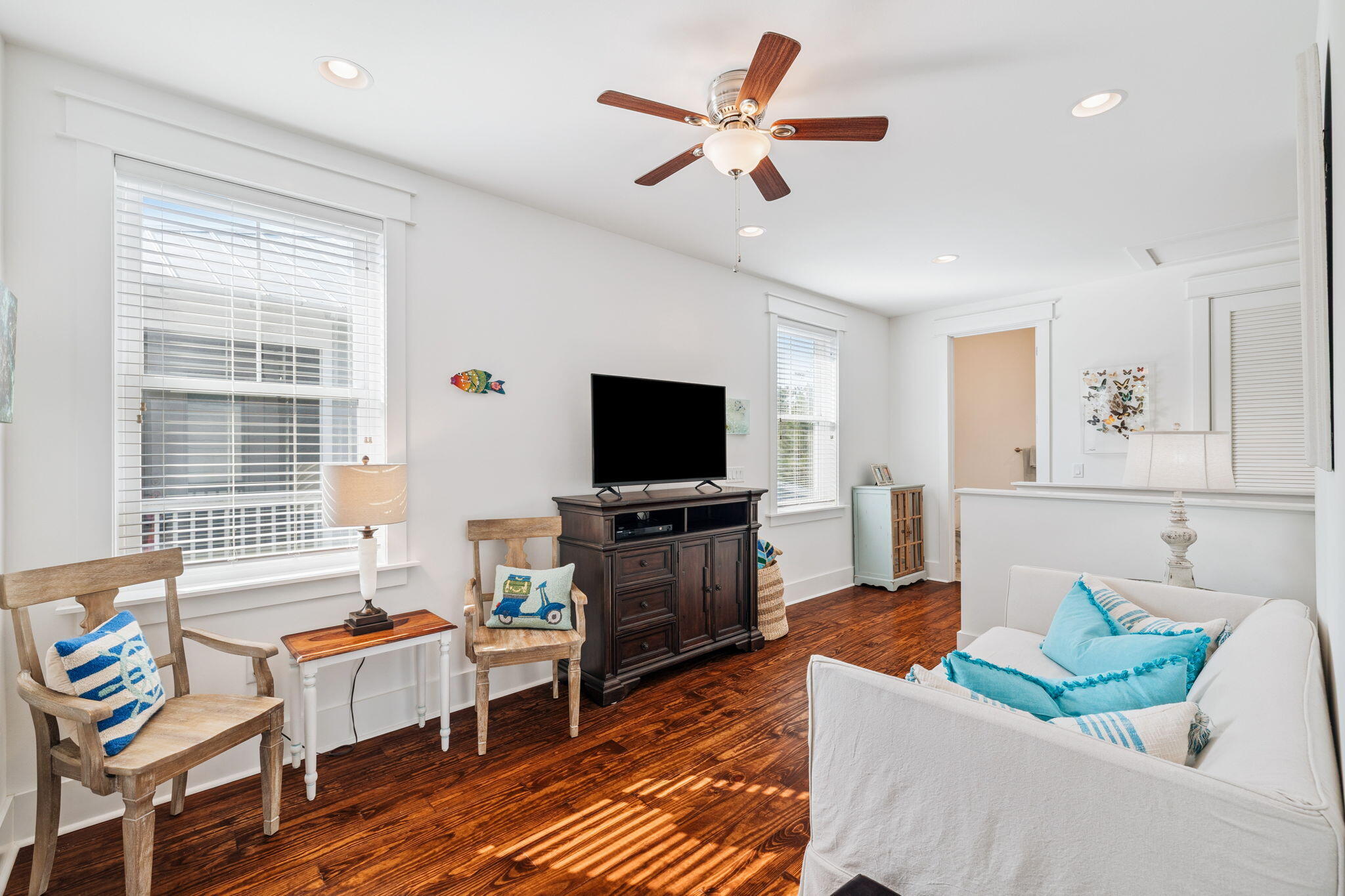 844 Sandgrass Boulevard Santa Rosa Beach, FL 32459 - Photo 38 of 74 a living room with furniture and a flat screen tv
