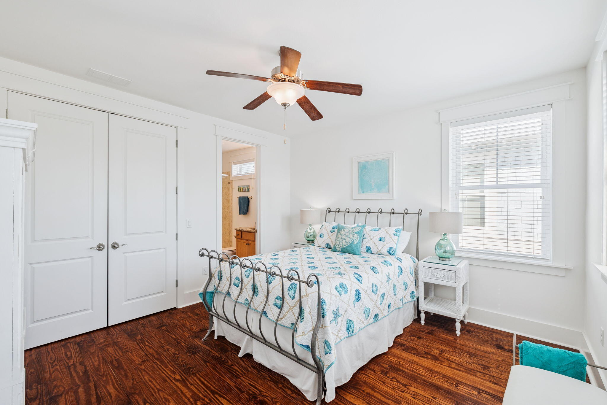 844 Sandgrass Boulevard Santa Rosa Beach, FL 32459 - Photo 42 of 74 a bedroom with a bed and wooden floor