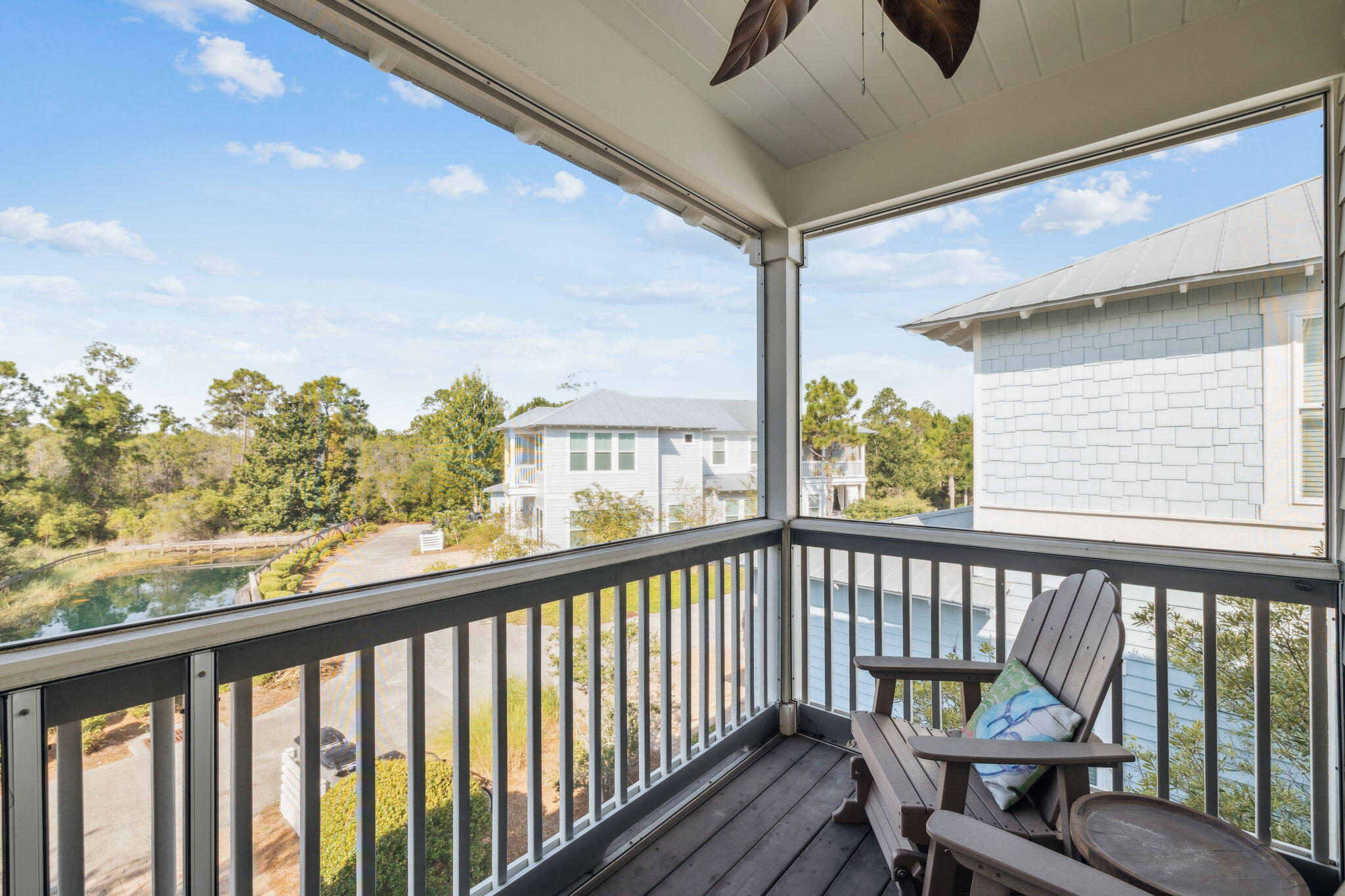 844 Sandgrass Boulevard Santa Rosa Beach, FL 32459 - Photo 49 of 74 a view of a balcony with furniture