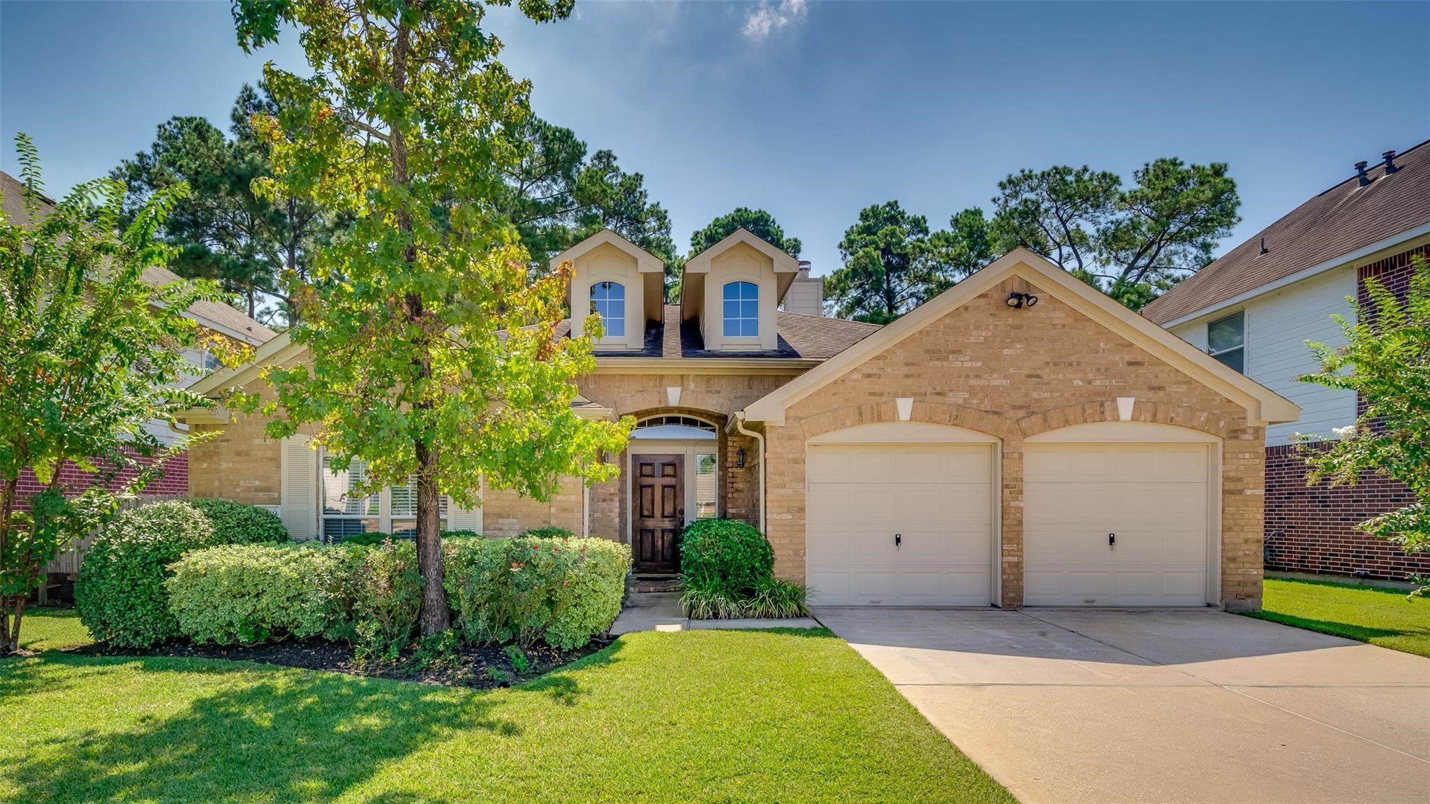 3419 La Fleur Lane Spring, TX 77388 - Photo 2 of 26 a front view of a house with garden