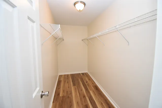 a view of a room with racks on the wall