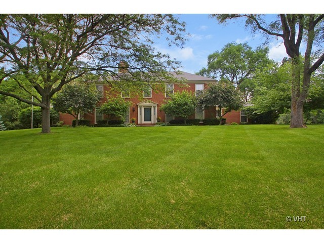 1742 Appleby Road Inverness, IL 60067 - Photo 1 of 25 a view of a building with a yard