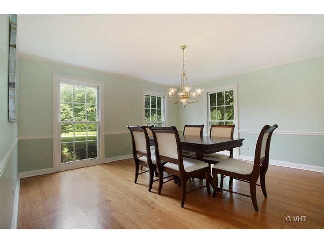 1742 Appleby Road Inverness, IL 60067 - Photo 4 of 25 a view of a dining room with furniture window and wooden floor