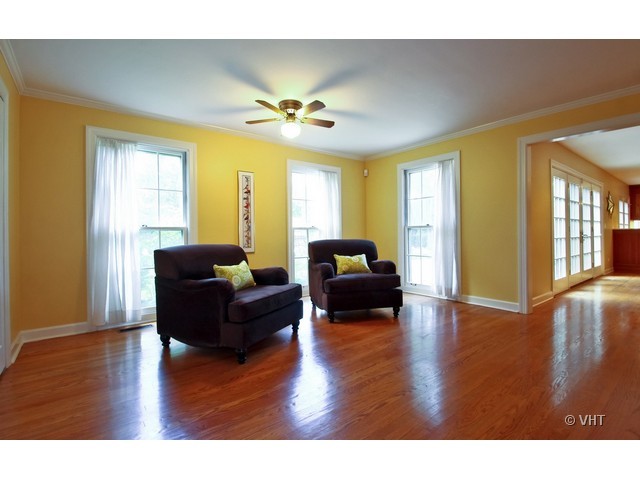 1742 Appleby Road Inverness, IL 60067 - Photo 8 of 25 a living room with couches and a coffee table