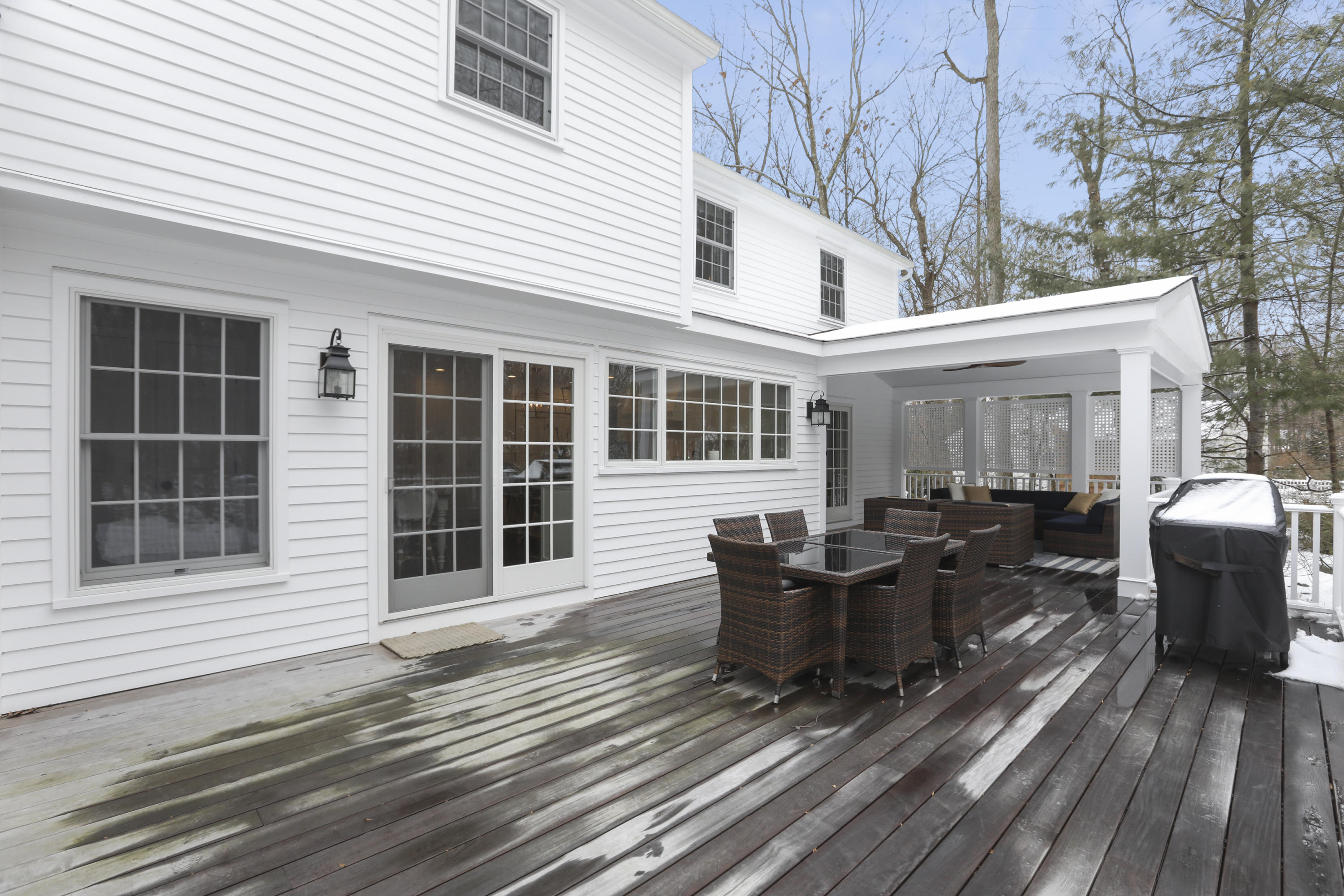 27 Deepwood Road Darien, CT 06820 - Photo 23 of 48 a view of a house with sitting area and wooden flooring