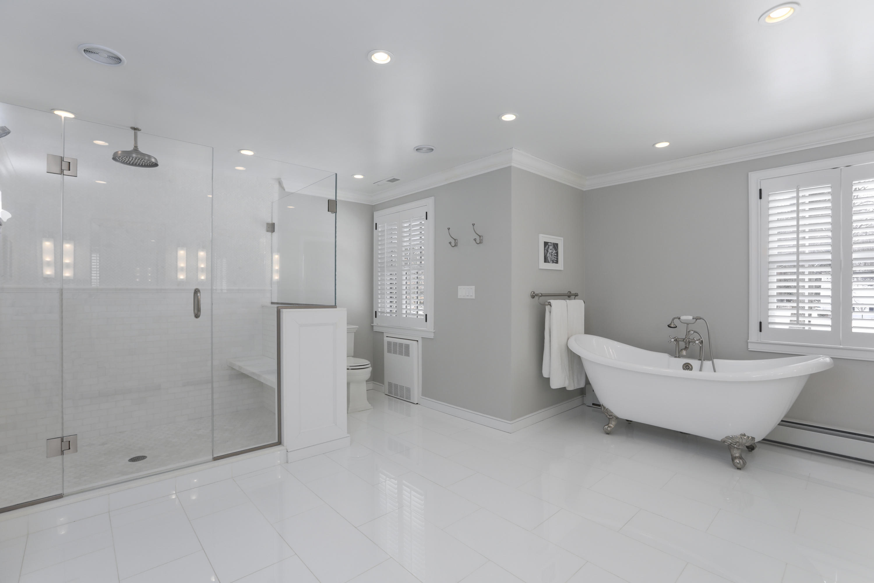 27 Deepwood Road Darien, CT 06820 - Photo 33 of 48 a bathroom with a bathtub and a shower