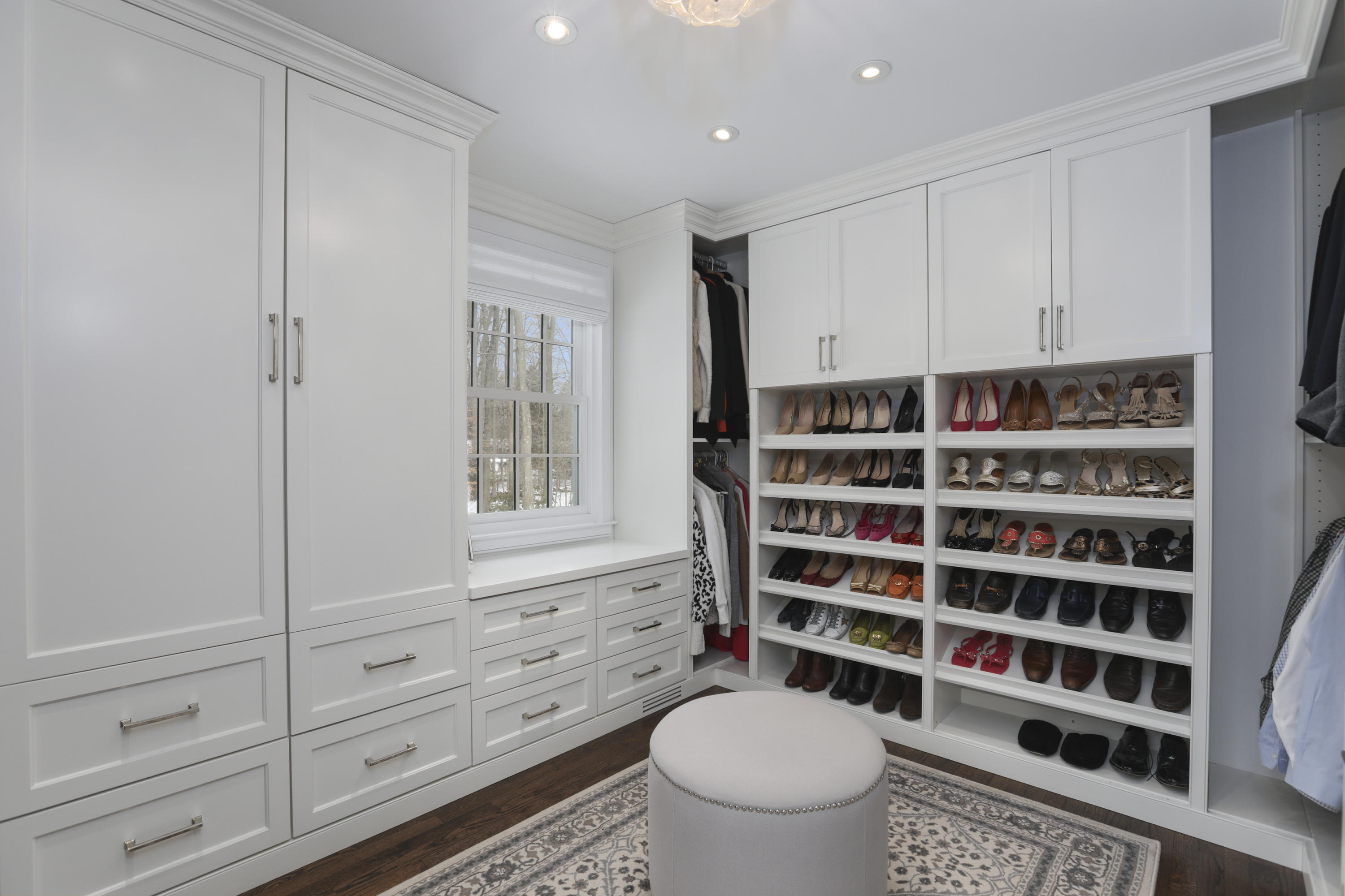 27 Deepwood Road Darien, CT 06820 - Photo 35 of 48 a view of walk in closet with empty racks