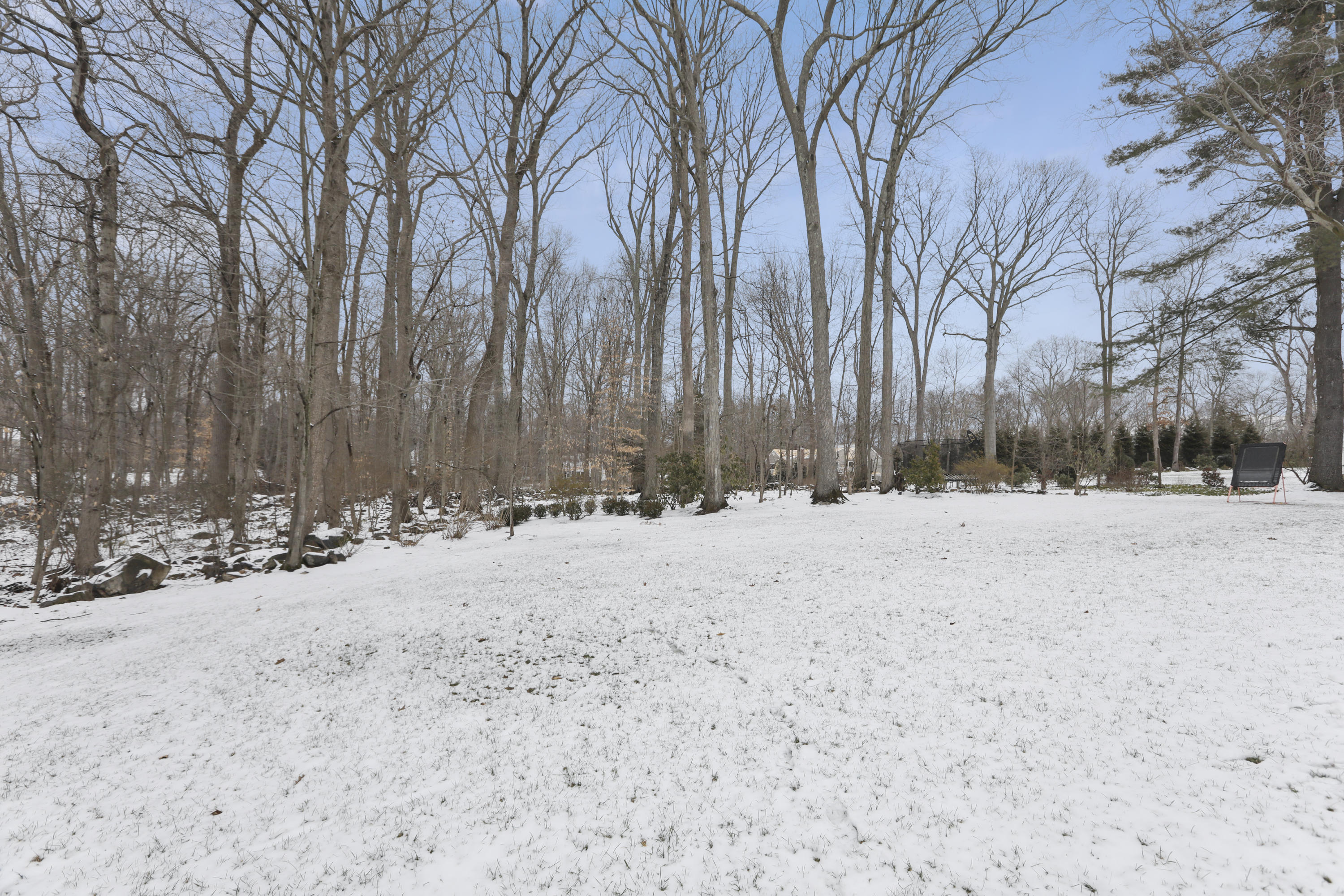 27 Deepwood Road Darien, CT 06820 - Photo 44 of 48 a view of snow on the road