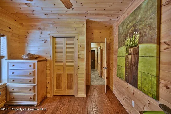 a bathroom with a tub and shower