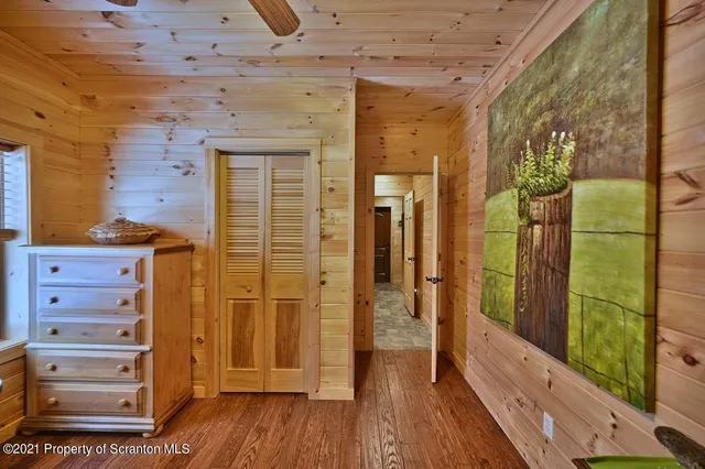 a bathroom with a tub and shower