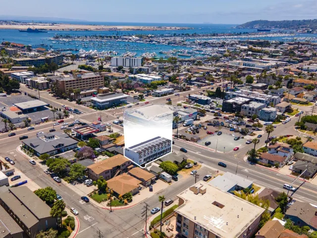 an aerial view of a city with lots of residential buildings
