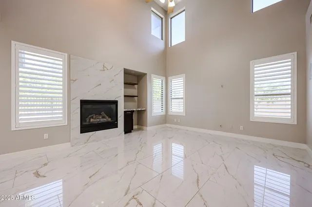 a kitchen with stainless steel appliances granite countertop a refrigerator sink and cabinets
