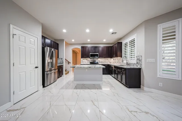 a view of a backyard with a garden