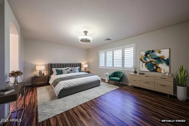 a swimming pool with outdoor seating and yard