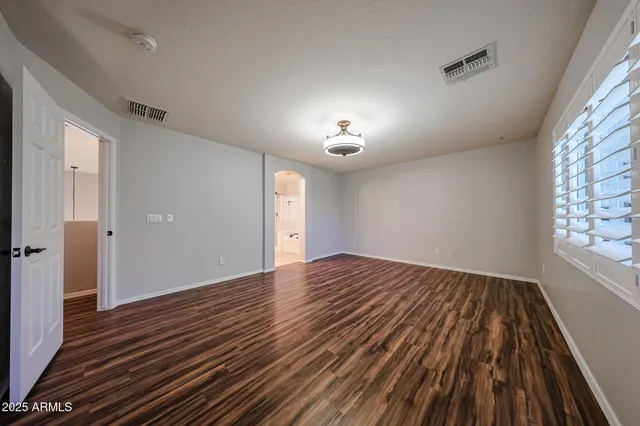 a view of a backyard of a house